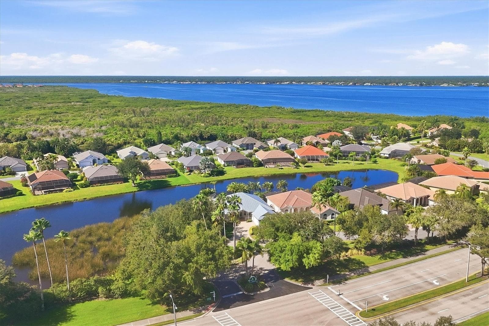3200 Bay Ridge Way offers privacy along its East side and Lake views to the SW - 3200 BAY RIDGE WAY, PORT CHARLOTTE