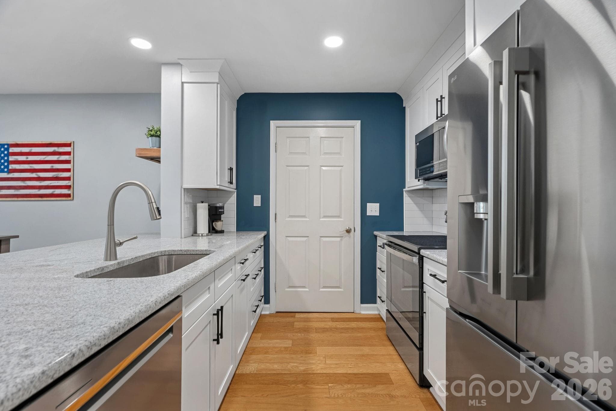Updated Kitchen with Quartz Countertops, New SS appliances (2023) - 103 Pier 33 Drive, Mooresville