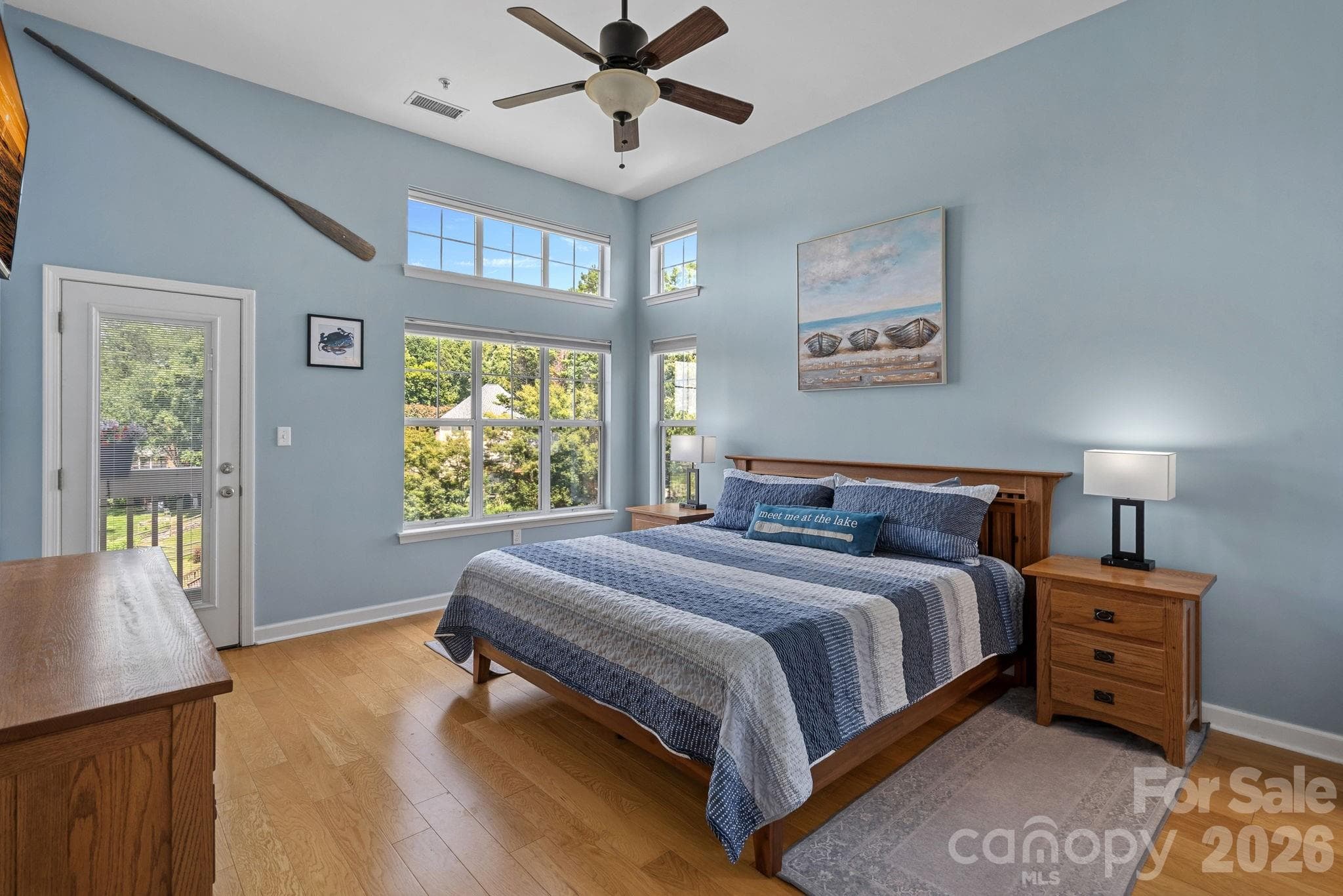 Primary Bedroom- Views of the water and Mechanical Shades - 103 Pier 33 Drive, Mooresville