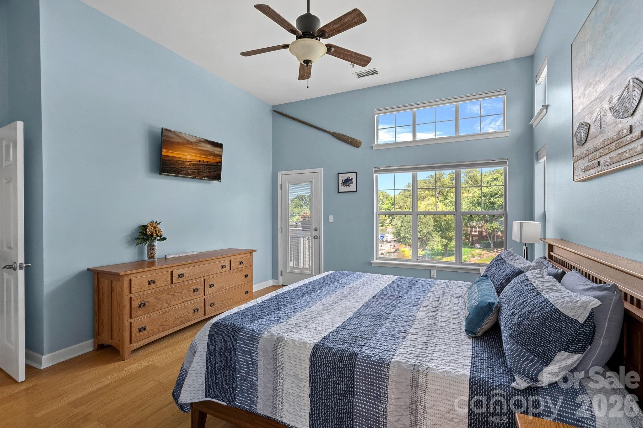 Primary Bedroom- Views of the water and Mechanical Shades - 103 Pier 33 Drive, Mooresville