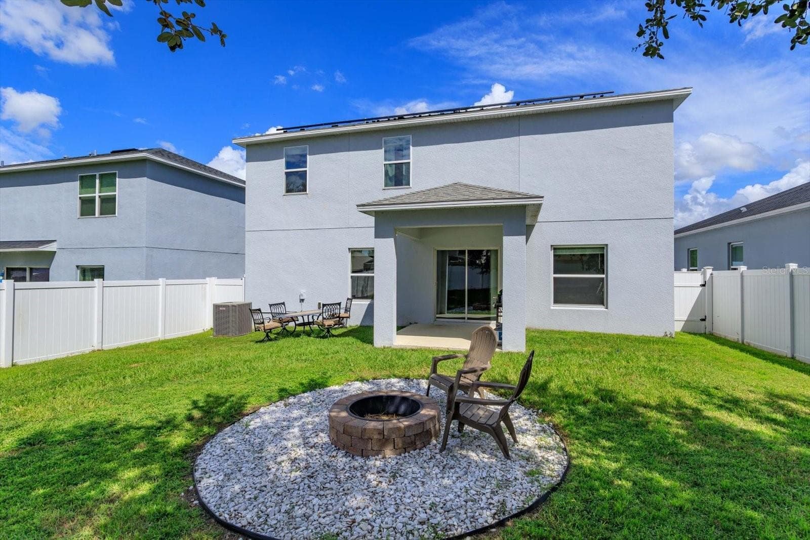 Fire-Pit in Backyard - 89 PRAIRIE FALCON DR, GROVELAND