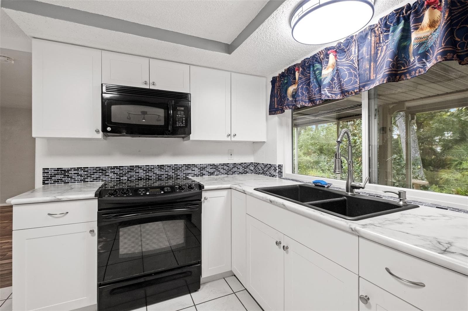 Single Family Residence at 8024 BEAVER CREEK LOOP, HUDSON, photo 18 of 58