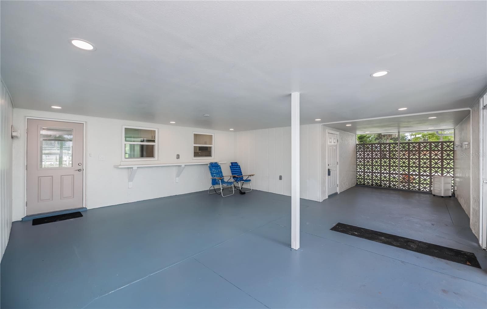 Massive front covered patio with private entry to the primary bedroom/mother-in-law suite - 352 OAK ST, ENGLEWOOD