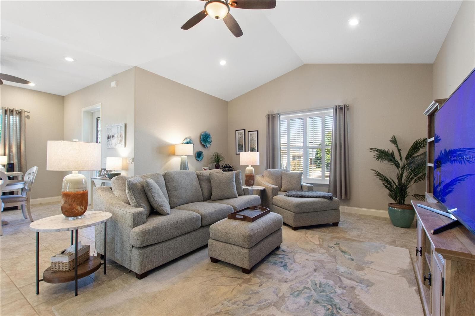 Living room with windows facing the front of the house - 1030 CROSS ROADS DR, POLK CITY
