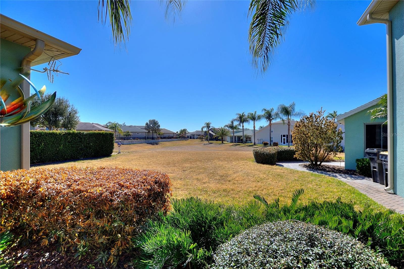 Back yard view from breezeway - 1030 CROSS ROADS DR, POLK CITY