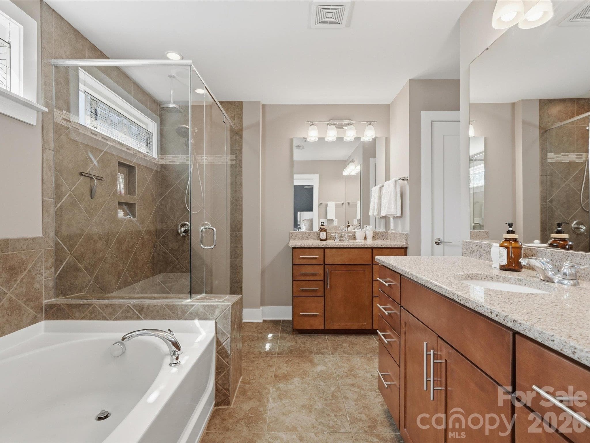Primary bath- dual vanities, tub and shower - 1806 Sunnyside Avenue, Charlotte