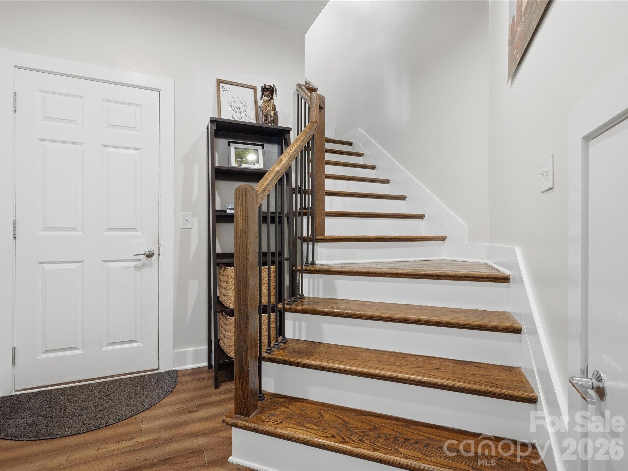 stairway from lower to main. Garage entry. - 1806 Sunnyside Avenue, Charlotte