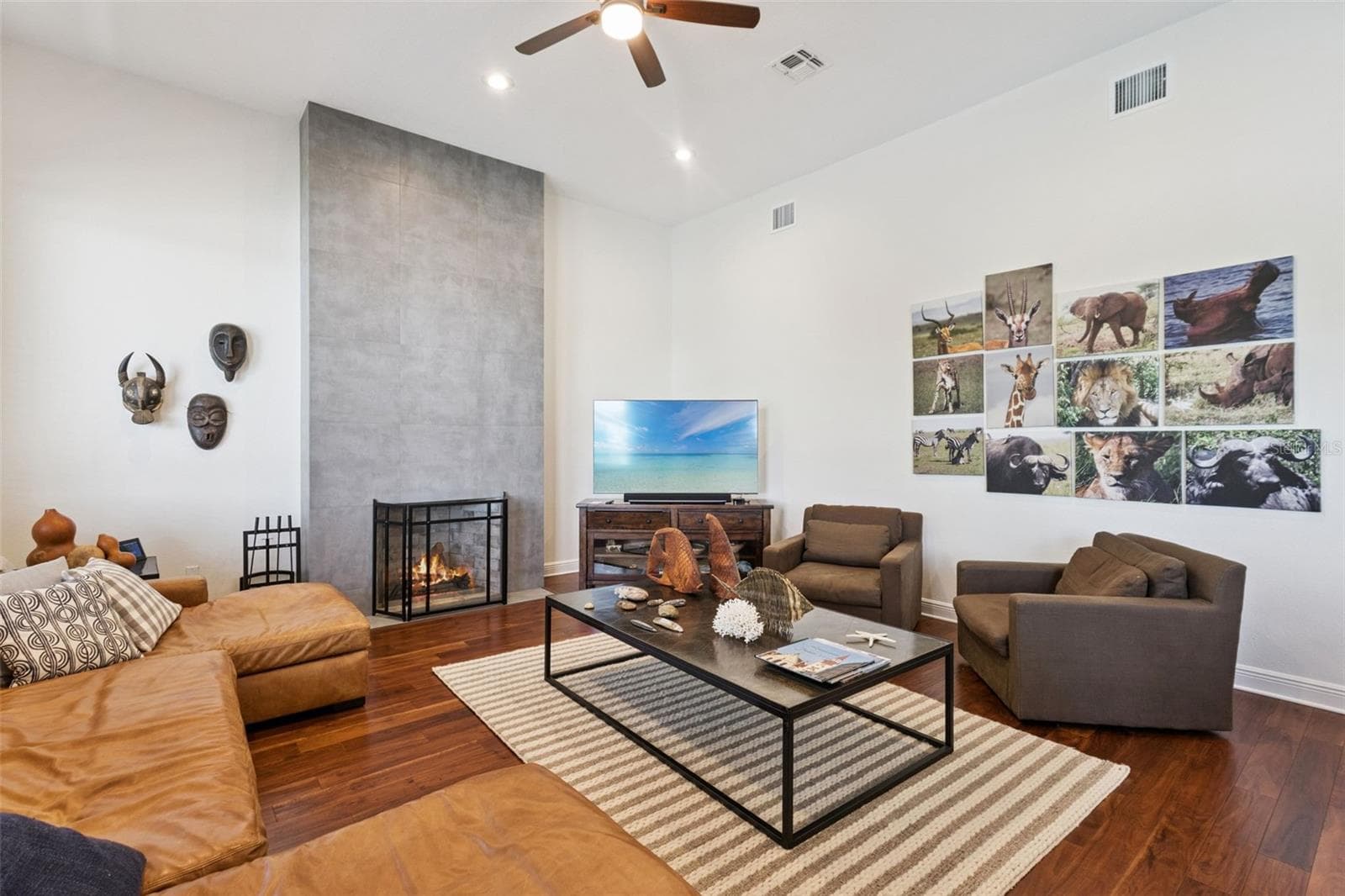 Family room with warming fireplace - view 2. - 3832 HUNTERS ISLE DR, ORLANDO