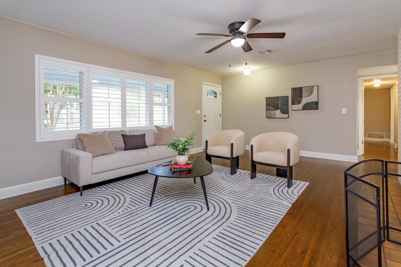 Hardwood floors throughout and plantation shutters - 1060 GREGORY DR, MAITLAND
