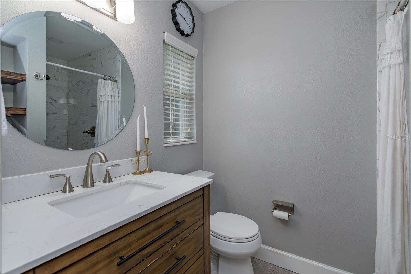 Primary ensuite with updated quartz-topped vanity and shower - 1060 GREGORY DR, MAITLAND