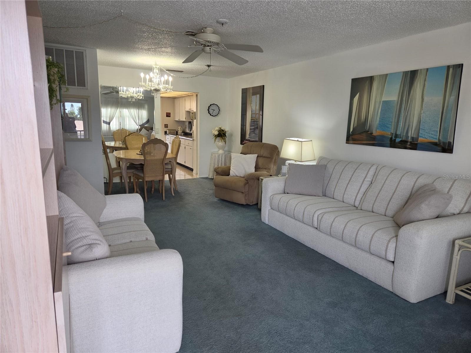 Nicely appointed living room - 5969 TERRACE PARK DR N #305, ST PETERSBURG
