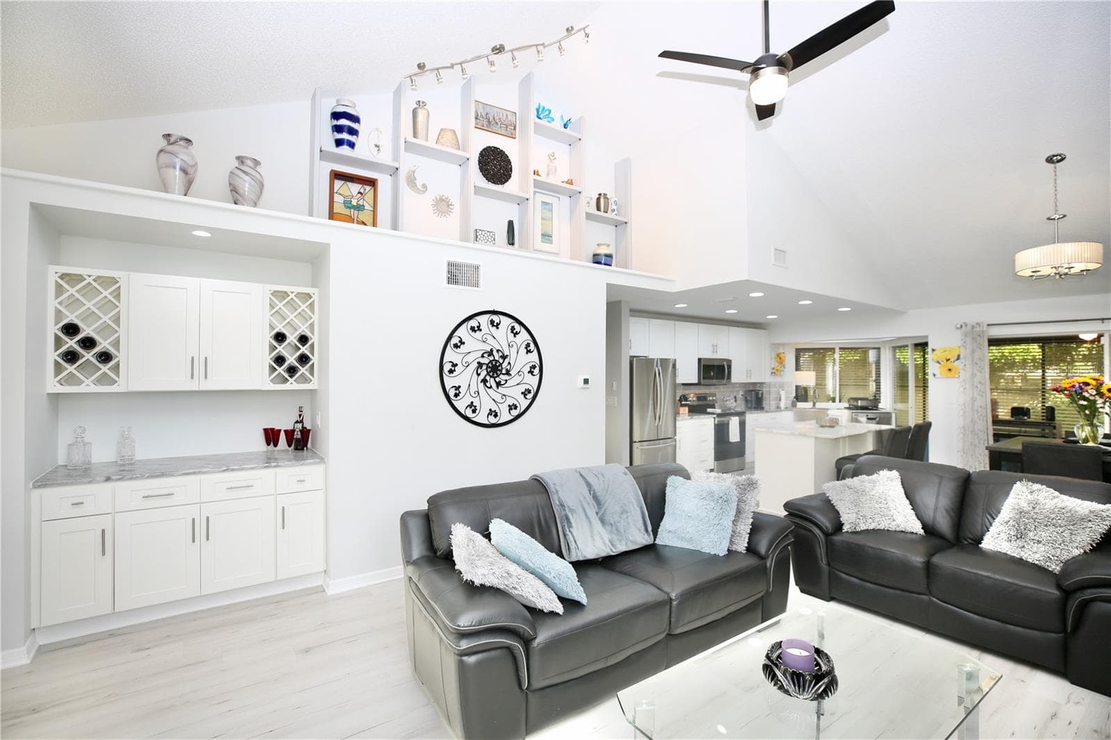 vaulted ceilings, new lighting and fan - 3540 COUNTRYBROOK LN #16, PALM HARBOR