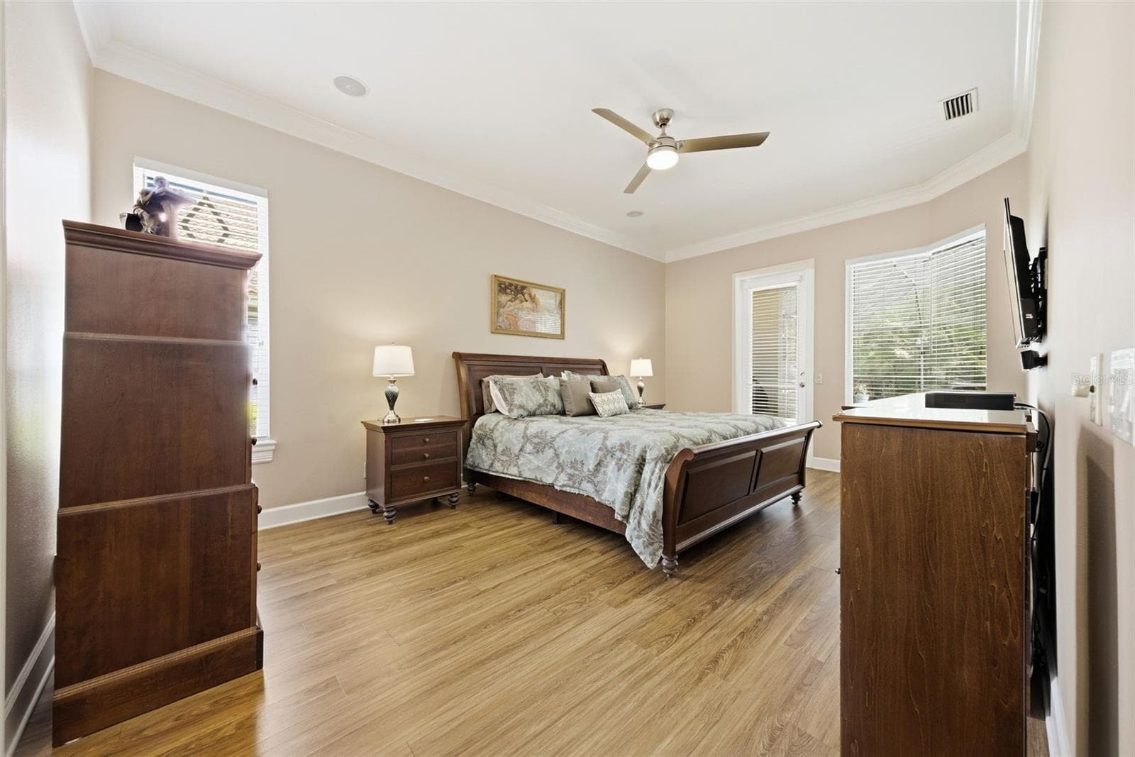 Primary bedroom overlooks pool - 2887 GREY OAKS BLVD, TARPON SPRINGS