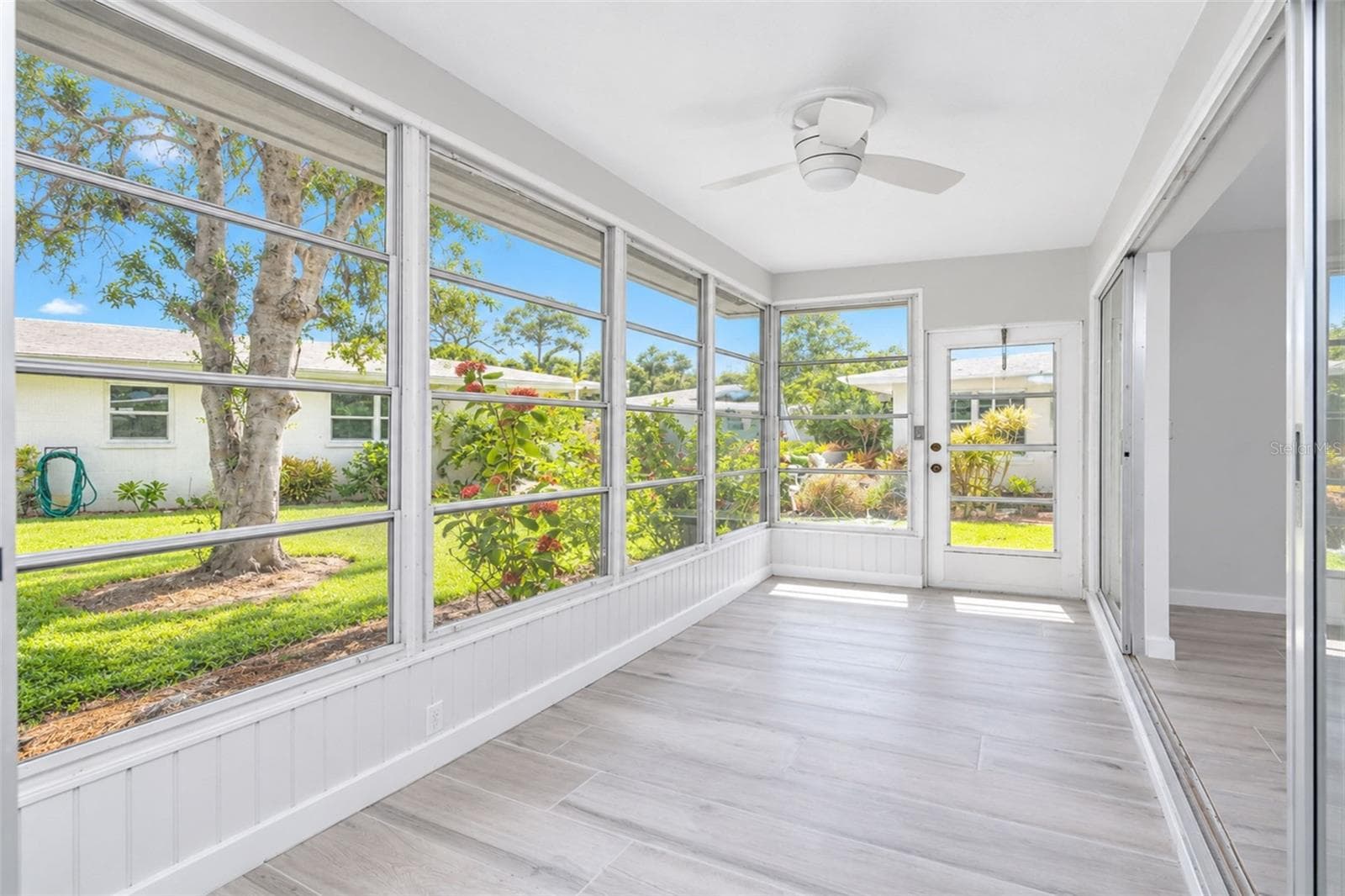 A door make you just steps away from the beautifully maintained back yard. - 206 BRIGANTINE WAY #206, NOKOMIS