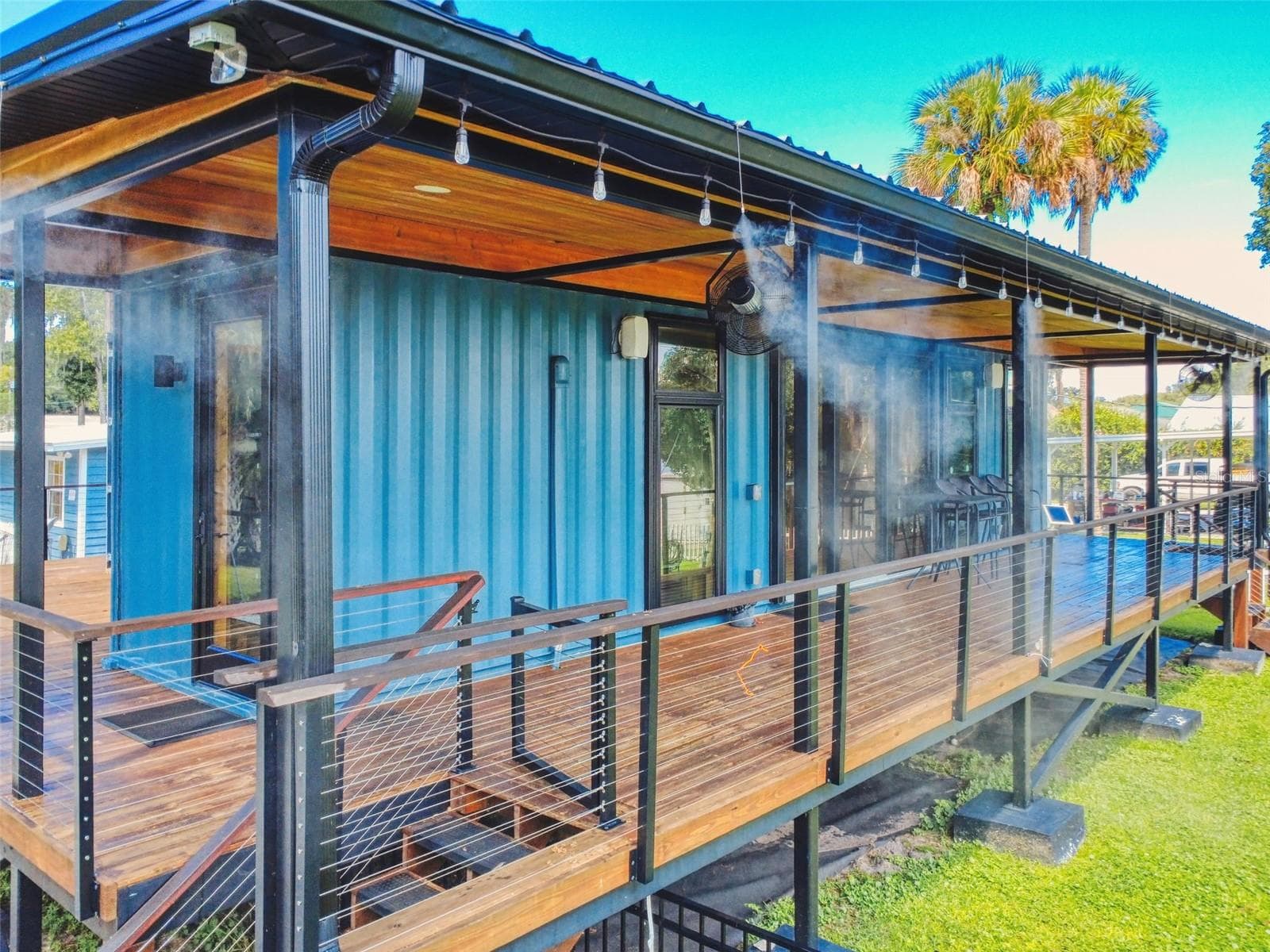 front deck with misters - 56108 SAWGRASS RD, ASTOR