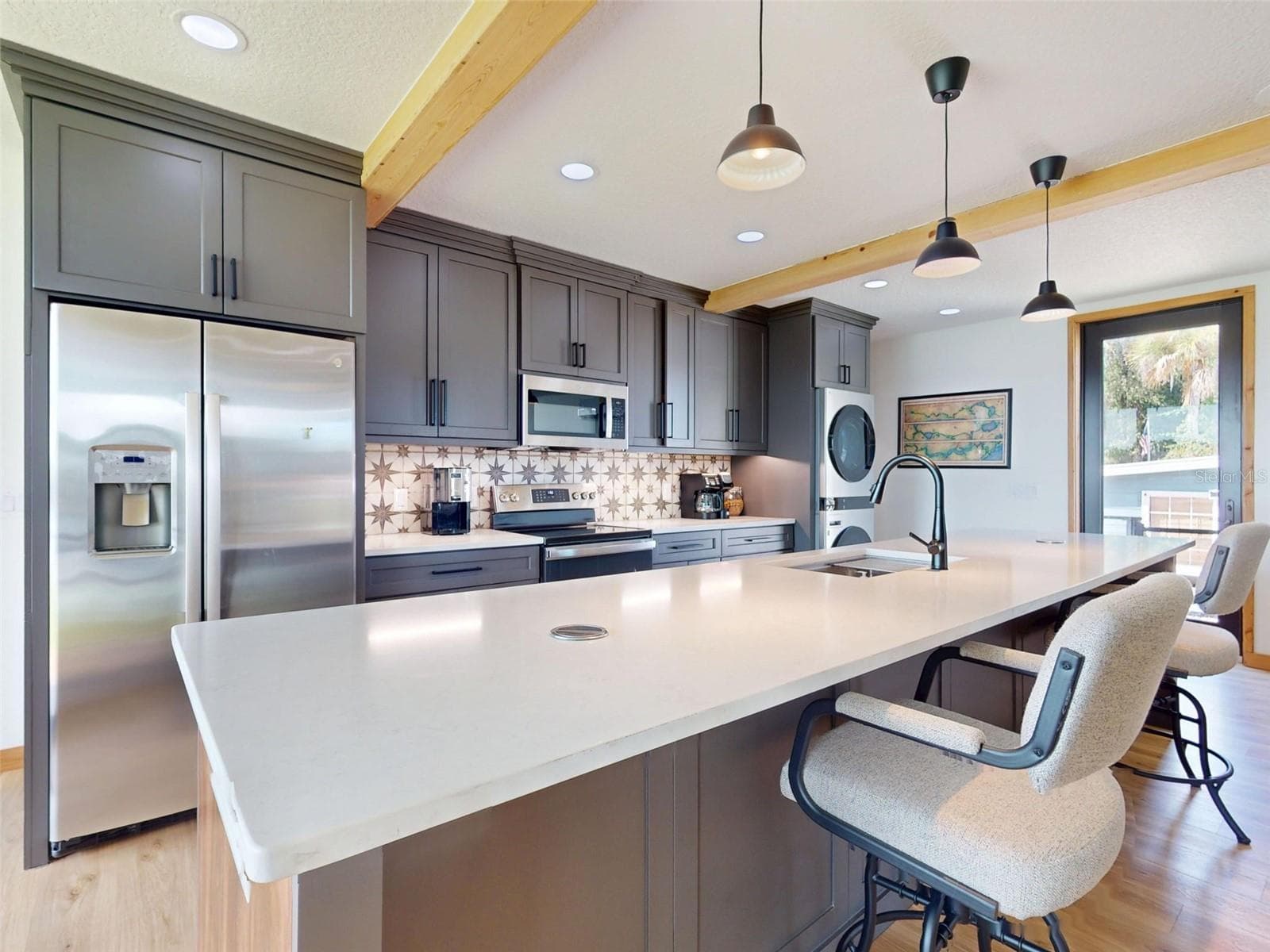 kitchen with snack bar - 56108 SAWGRASS RD, ASTOR