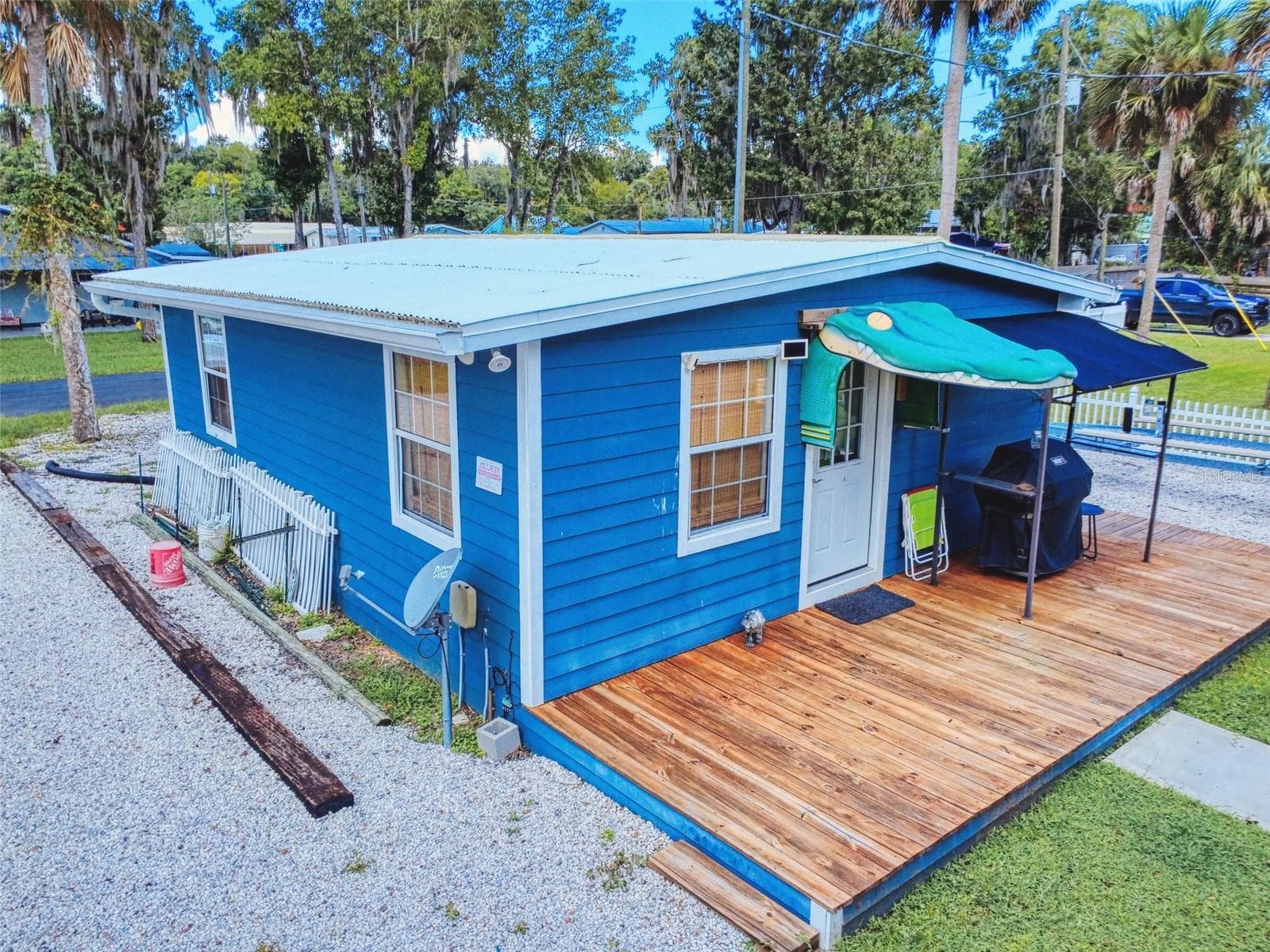 cottage deck - 56108 SAWGRASS RD, ASTOR