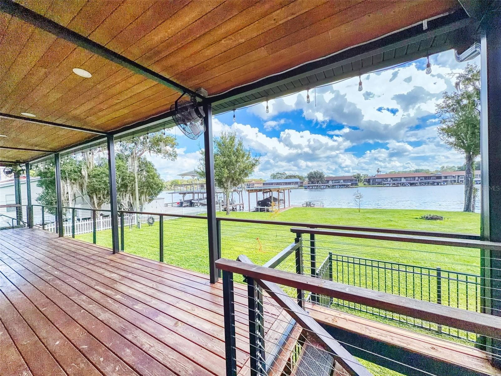 front deck overlooking river - 56108 SAWGRASS RD, ASTOR