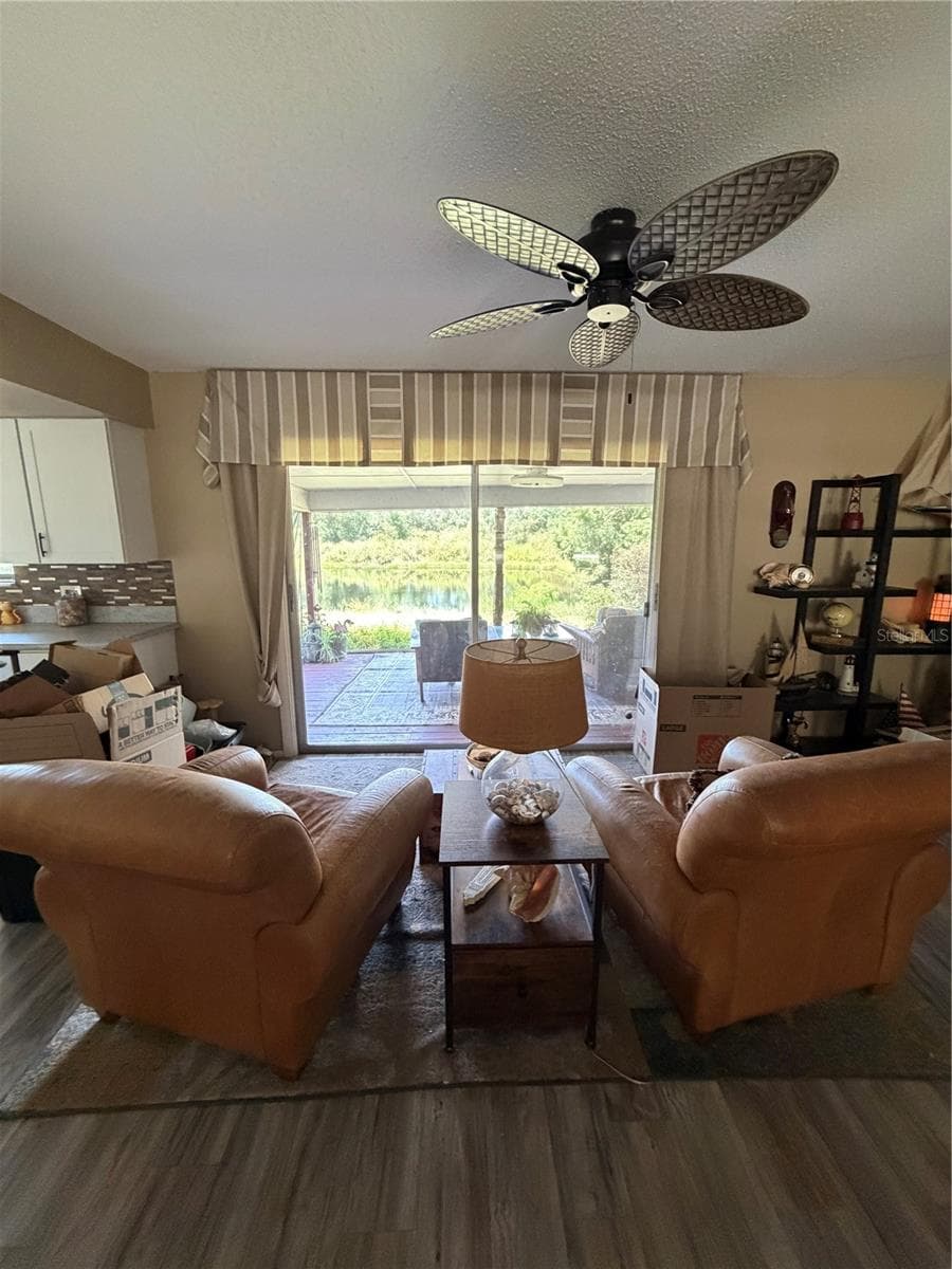 Living Room with lake view - 34205 RADIO RD, LEESBURG