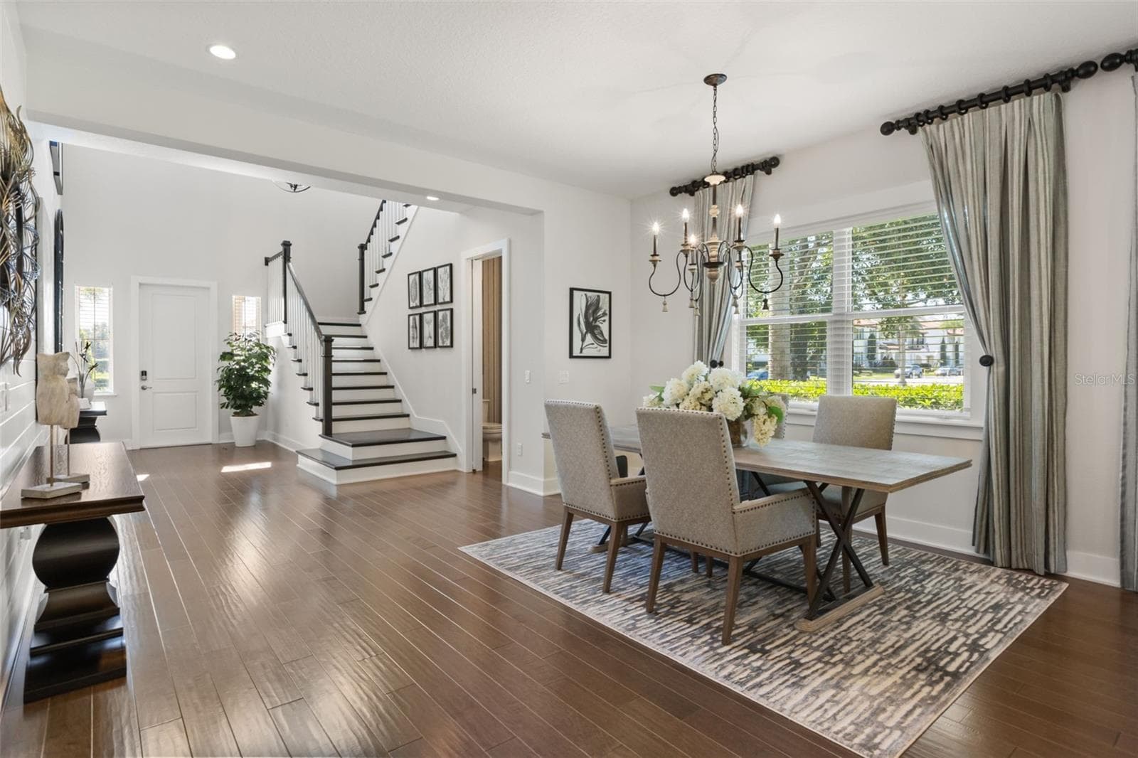 The homes first floor layout is long, open and elegant in design. - 8836 LAKESHORE POINTE DR, WINTER GARDEN