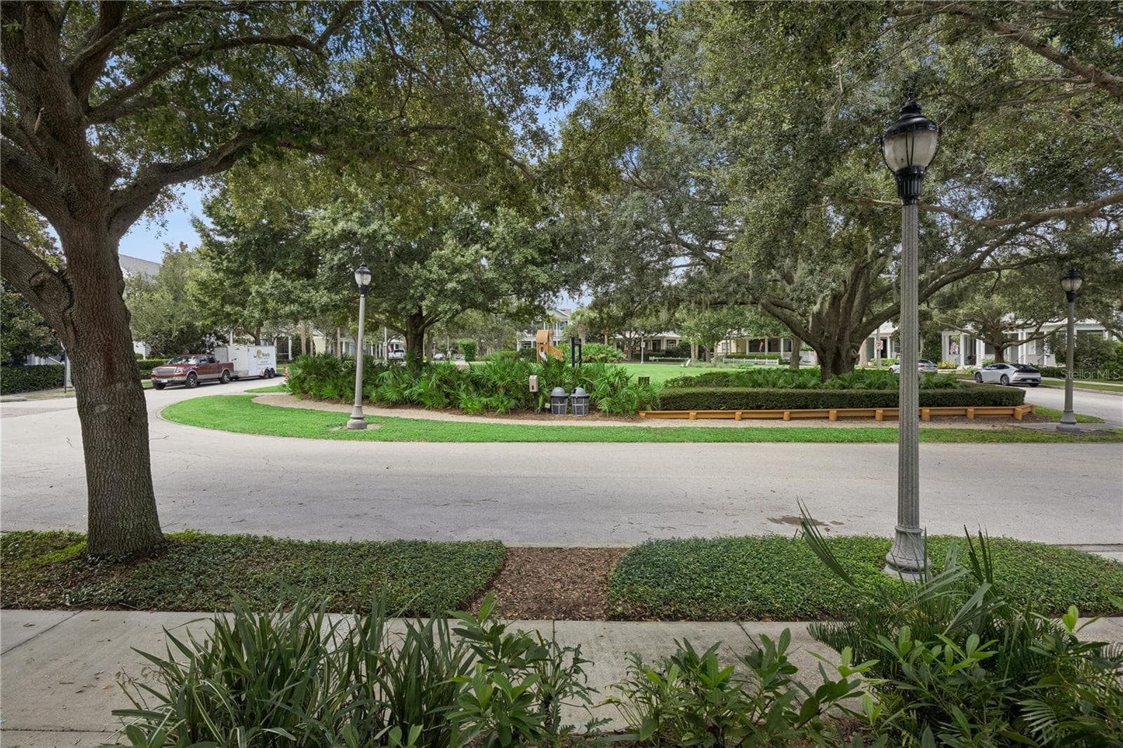 Serene park view from front porch - 1362 UNION CLUB DR, WINTER GARDEN