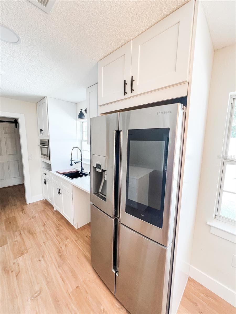 Single Family Residence at 1314 ROBIE AVE, MOUNT DORA, photo 6 of 34