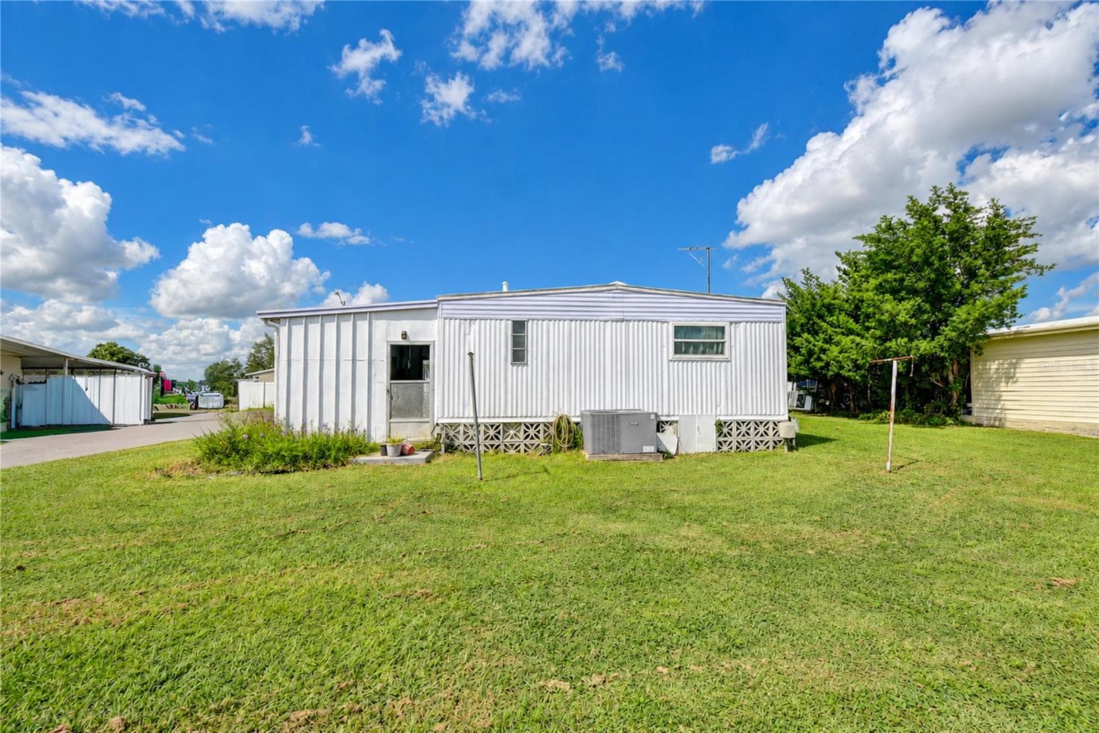 Backyard view - 4710 WINDY LN, ZEPHYRHILLS