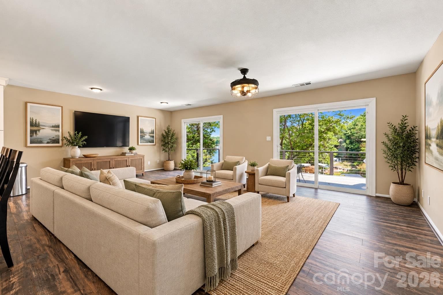 Virtually Staged Family Room with views of the lake and upper deck - 9071 Tulagi Court, Tega Cay