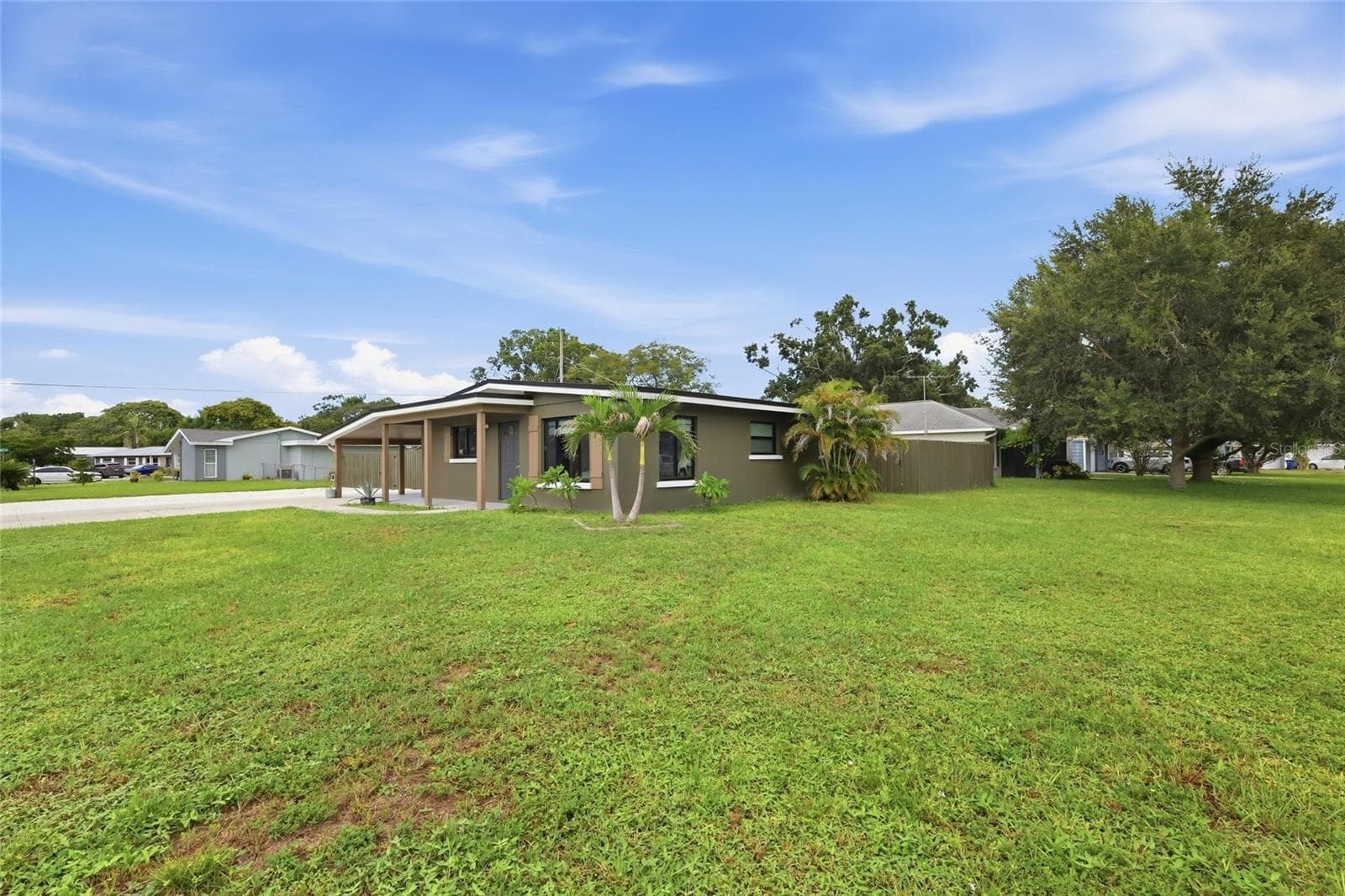 Other updates include: newer sewer line, newer hot water heater, new 250 amp electrical service, new AC ductwork, and new attic insulation - 5055 LAHAINA DR, SARASOTA