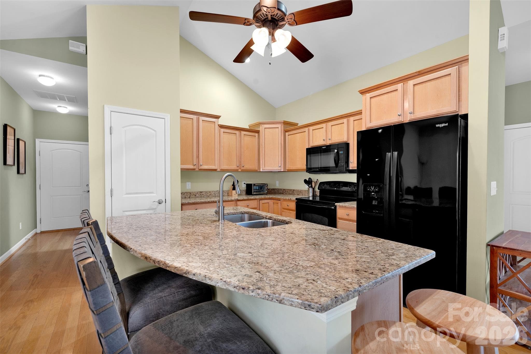 Gourmet kitchen with center island - 4767 Polo Gate Boulevard, Charlotte