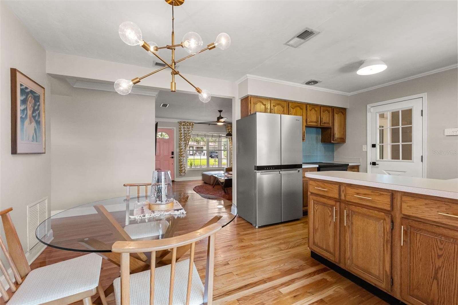 Open Concept Kitchen and Dining Space - 3105 PICKFAIR ST, ORLANDO