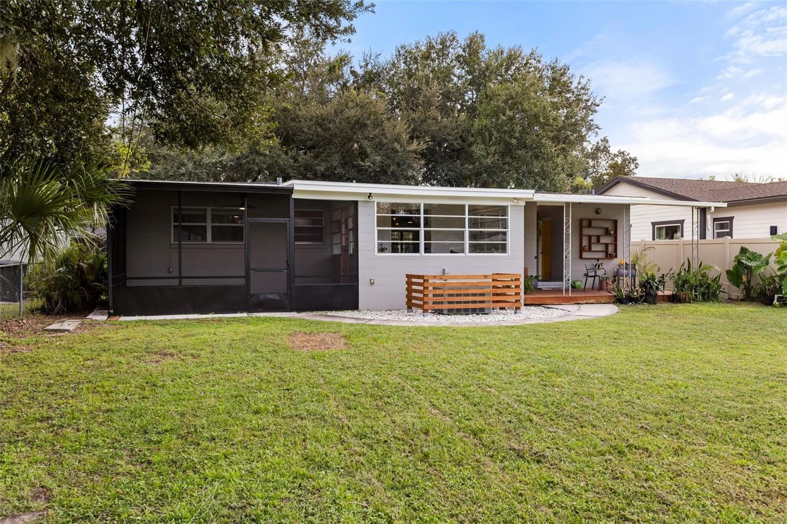 Features both screened in and open air covered patio space - 3105 PICKFAIR ST, ORLANDO