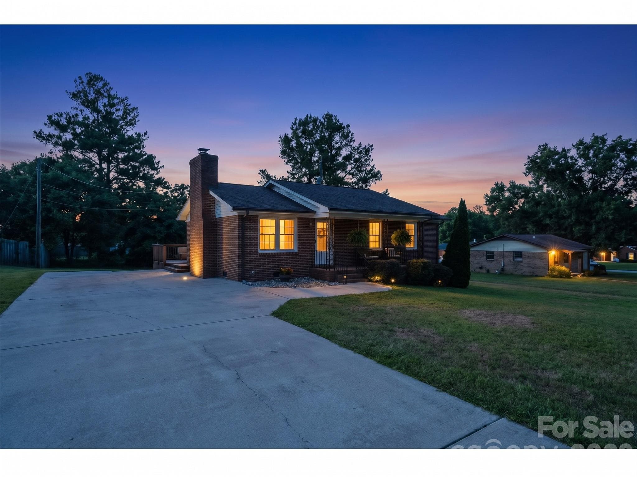 AI-Twilight View of the Front of the home with Ex-large driveway to Fit 4 plus Cars - 645 Pine Ridge Road, Chester