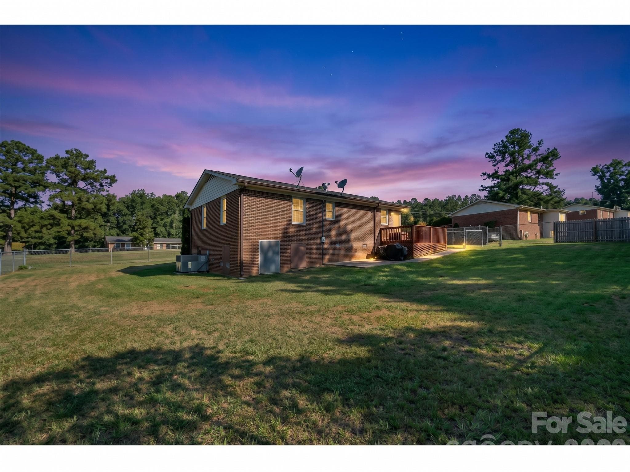 AI-Twilight View of the Backyard and back porch - 645 Pine Ridge Road, Chester