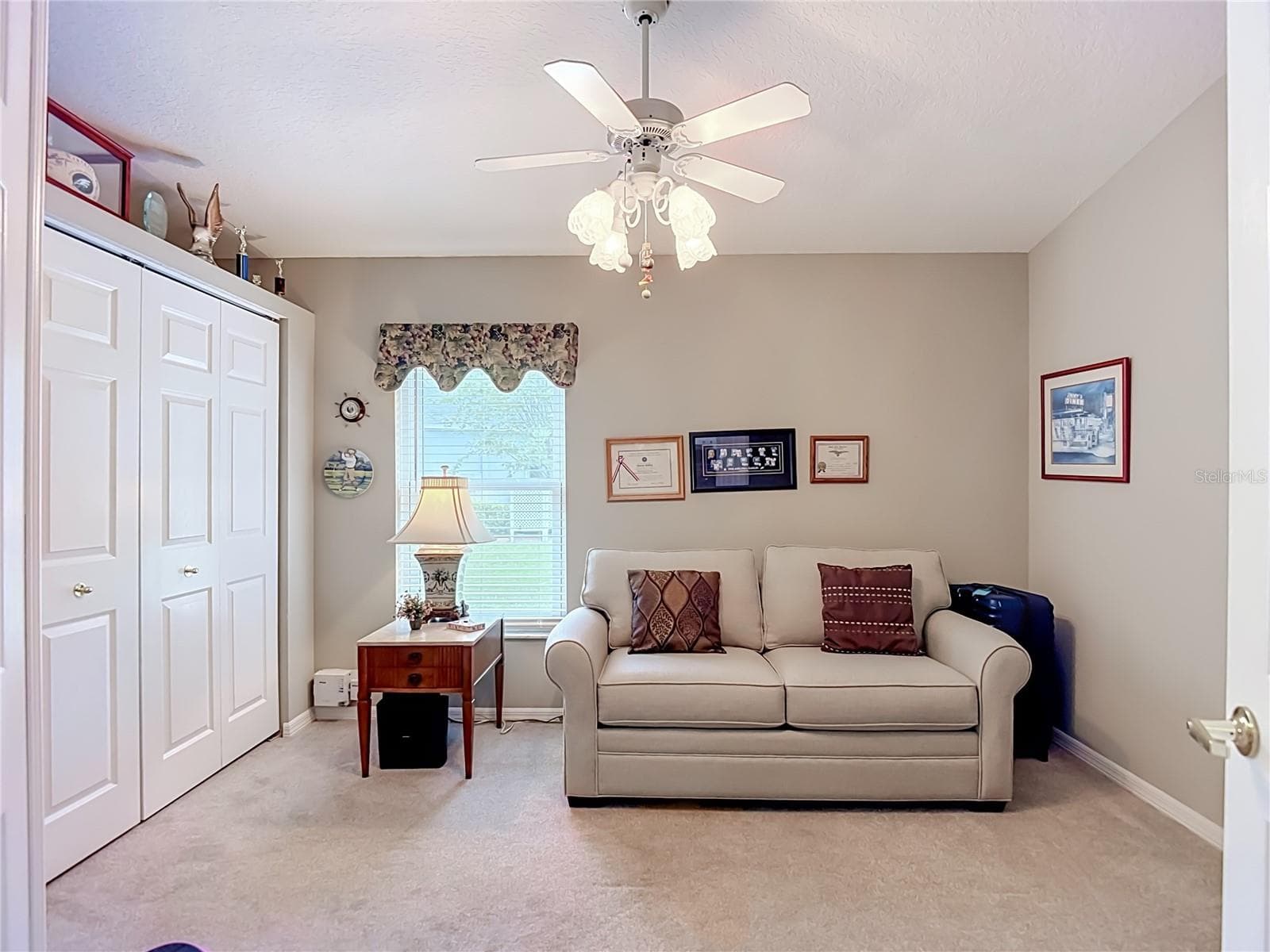 Bedroom 2 sits on carpet. Room has a lagre built in closet with a deep depth for larger suit cases oor other large items - 13428 NORMAN CIR, HUDSON