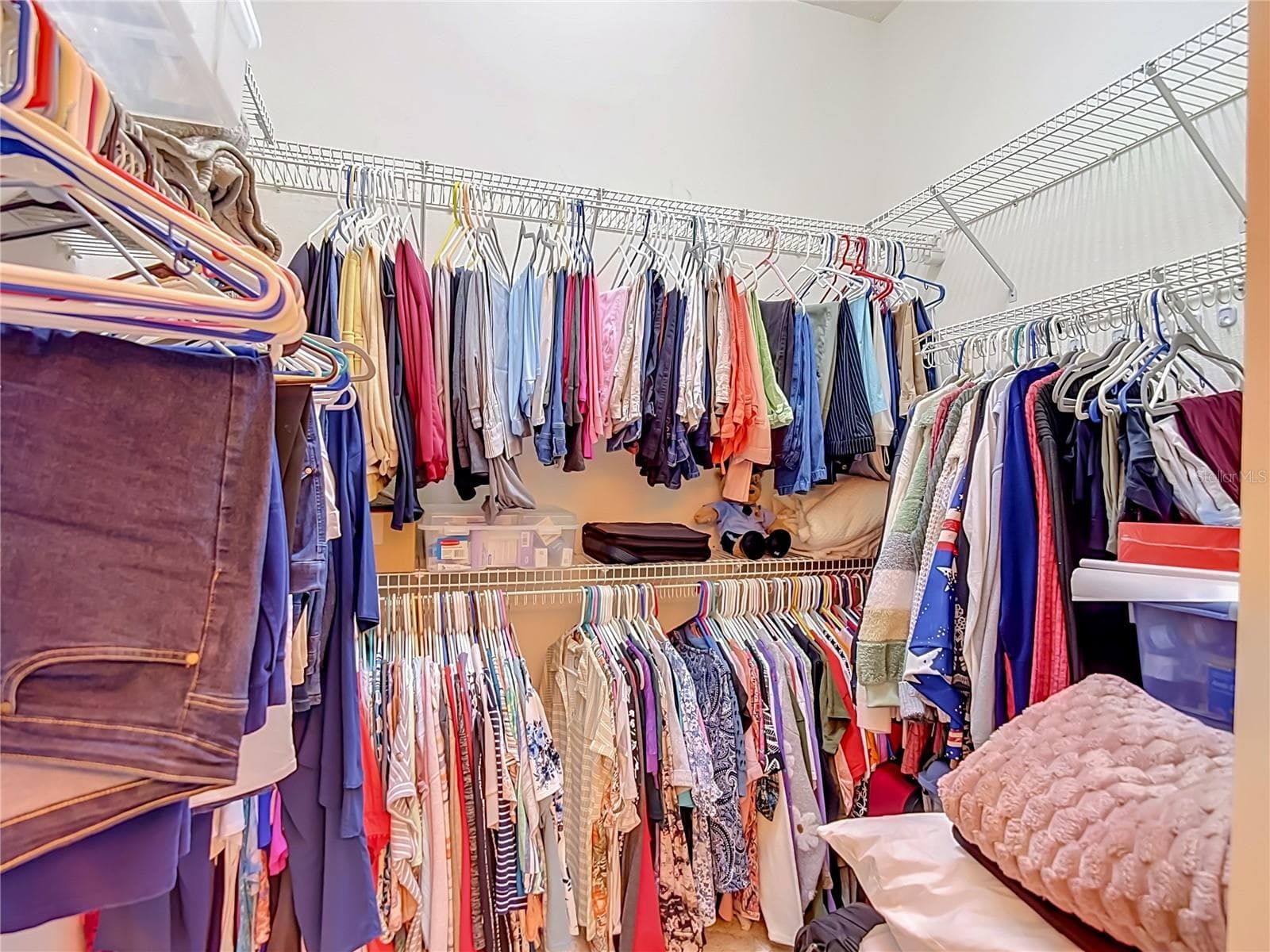 The walk in closet is in the bathroom and can handle quite a bit of clothing - 13428 NORMAN CIR, HUDSON