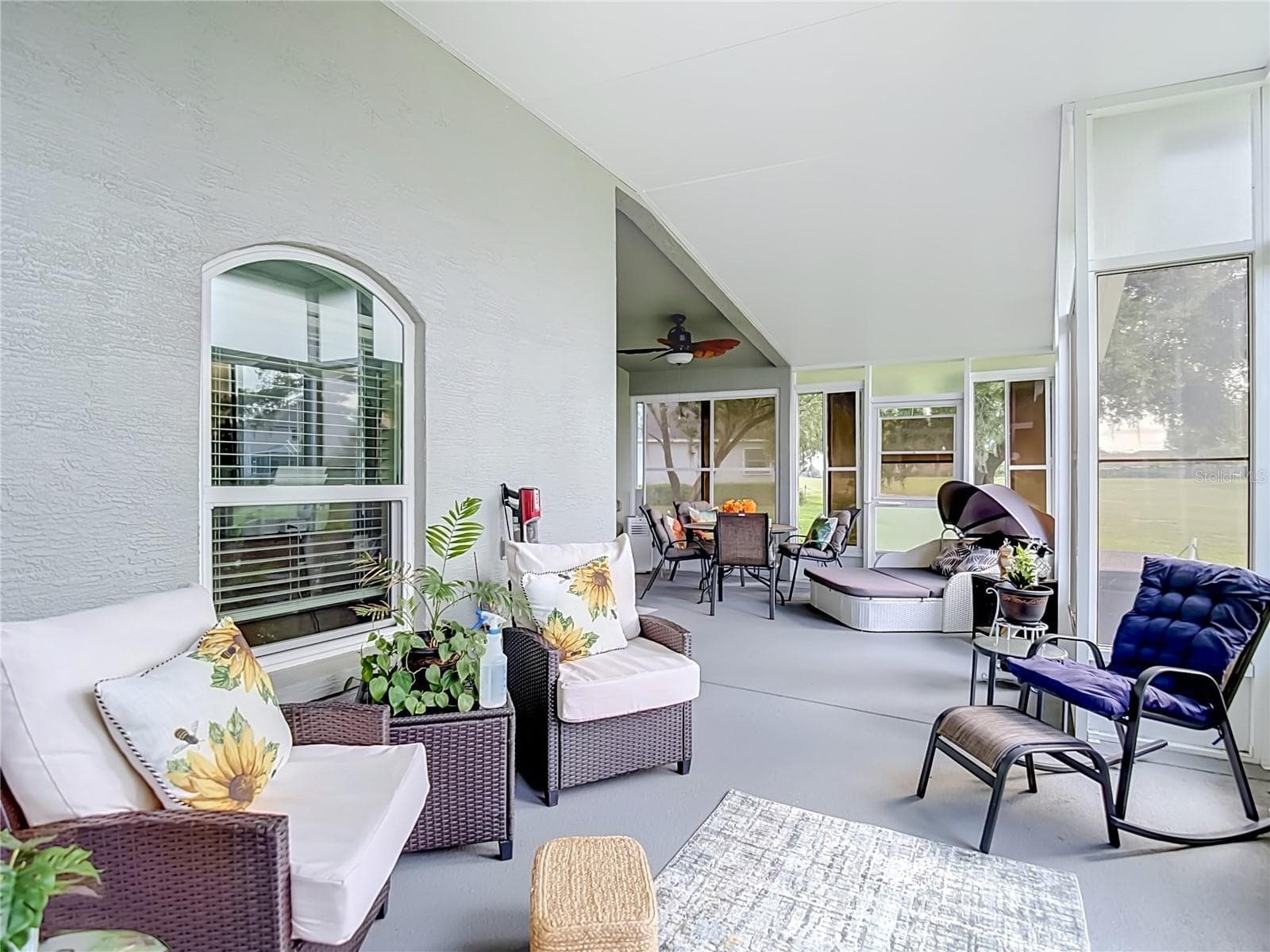 Another area of the patio / lanai. This outsie the primary bedroom's window. - 13428 NORMAN CIR, HUDSON