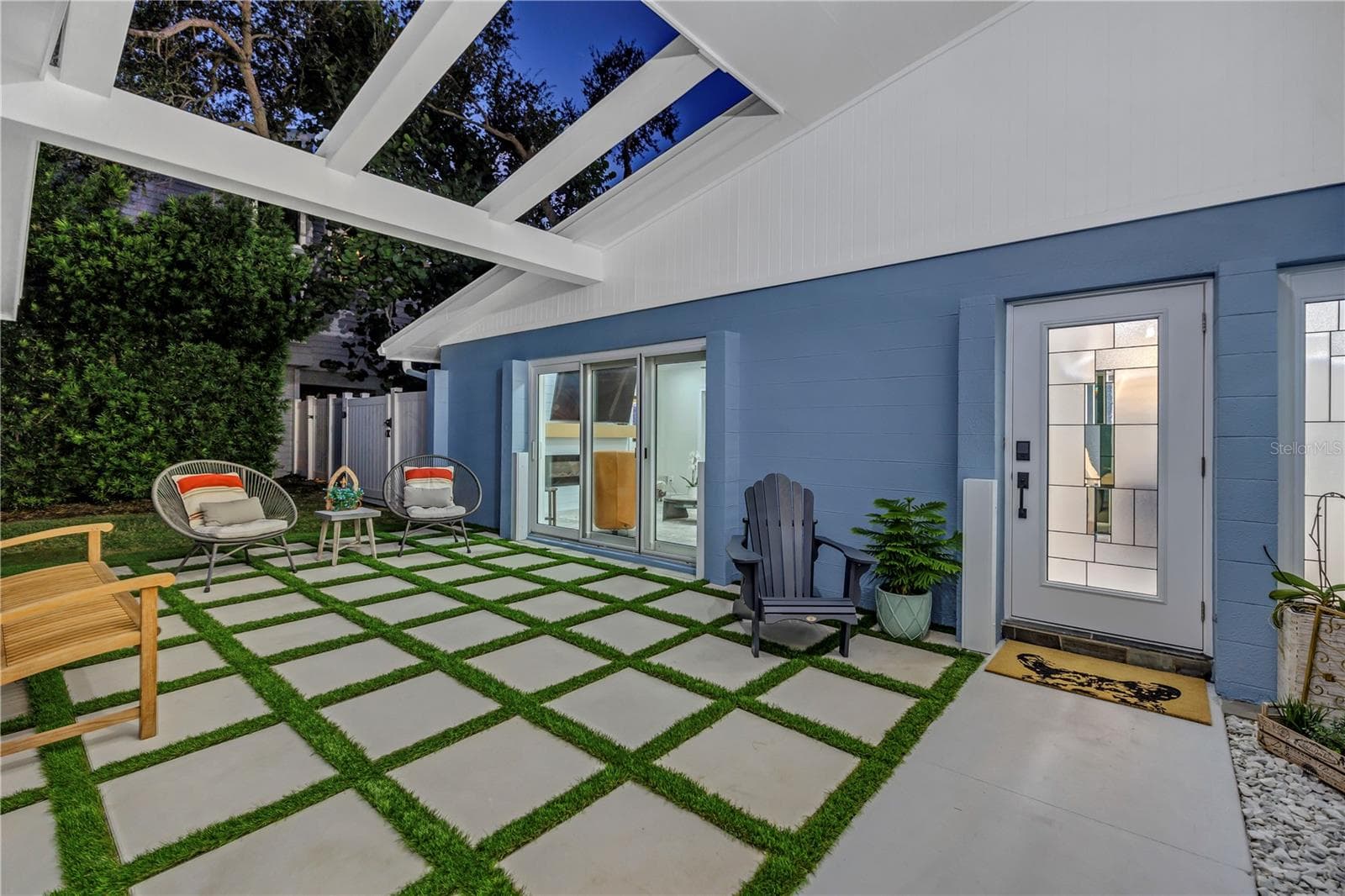 24 x 24 block pavers accented with astro turf. - 1114 2ND AVE S, TIERRA VERDE