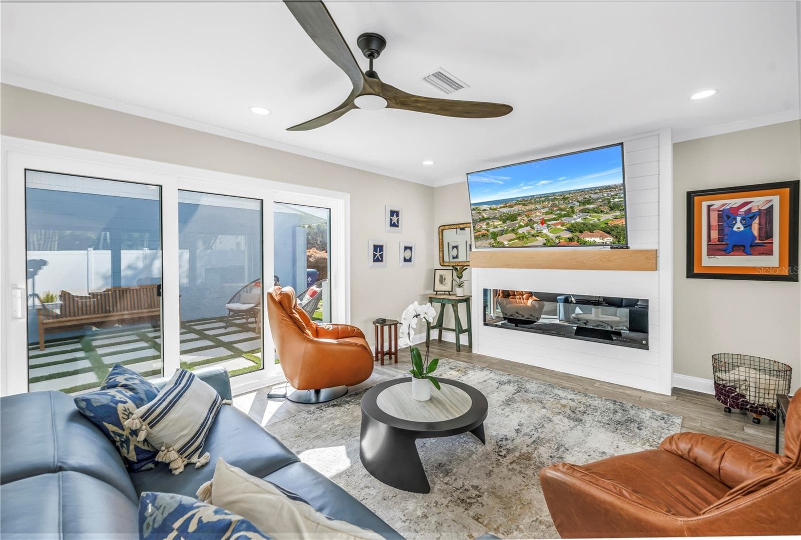 You are surrounded by the outdoors even as you snuggle up to the fireplace! - 1114 2ND AVE S, TIERRA VERDE