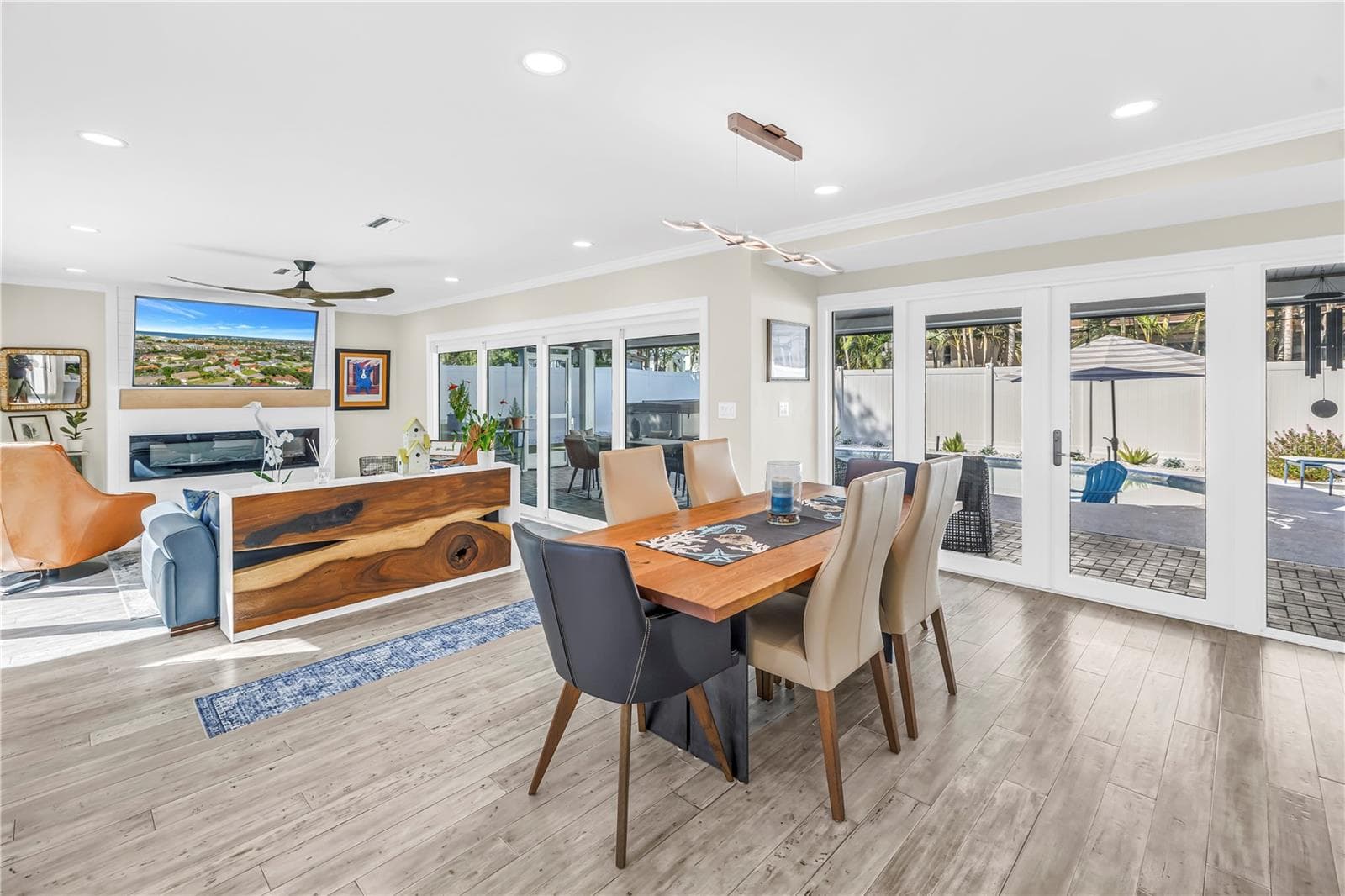Dining room opens into lanai through French Doors. - 1114 2ND AVE S, TIERRA VERDE