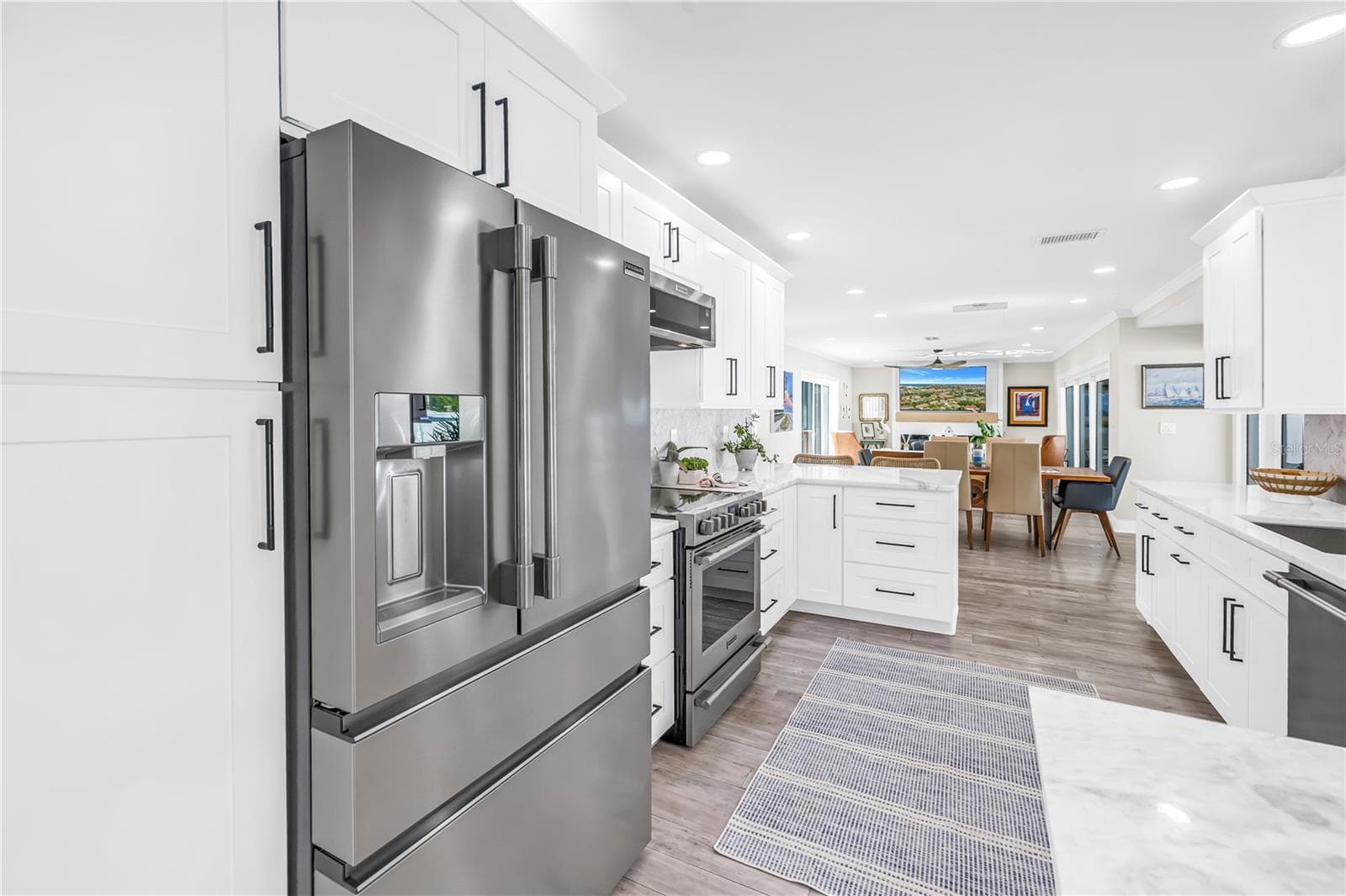 Stainless steel French style three drawer refrigerator and lots of panty space. - 1114 2ND AVE S, TIERRA VERDE