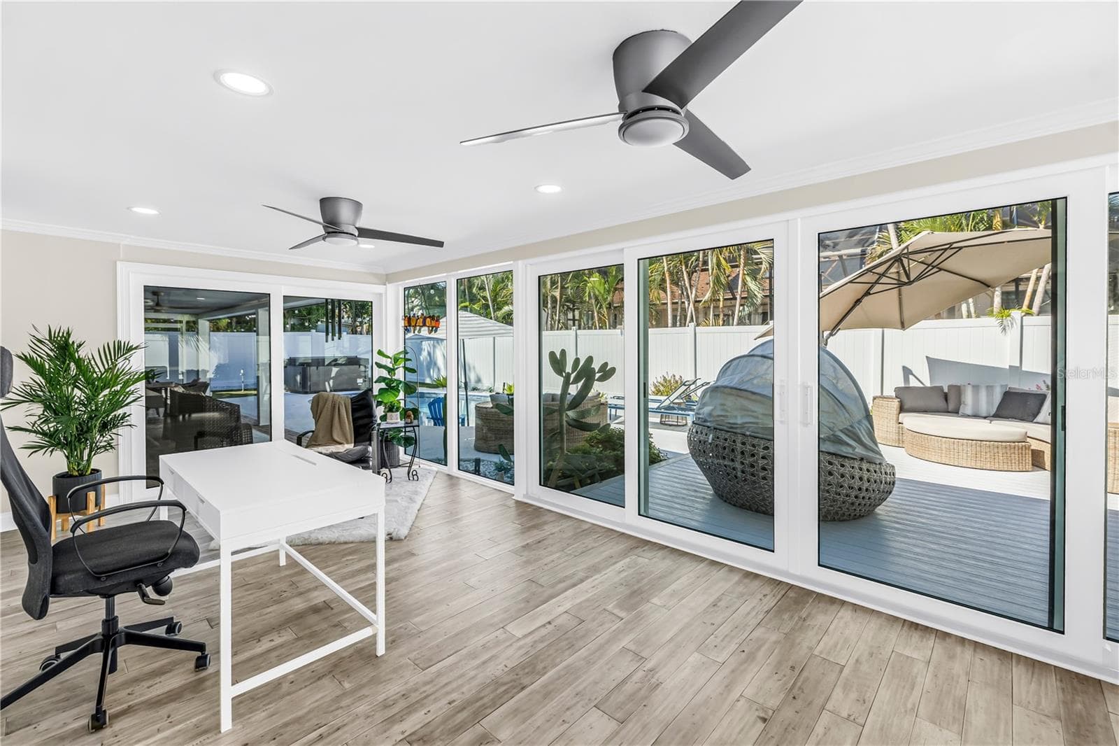 Indoor/ outdoor living rooms! - 1114 2ND AVE S, TIERRA VERDE