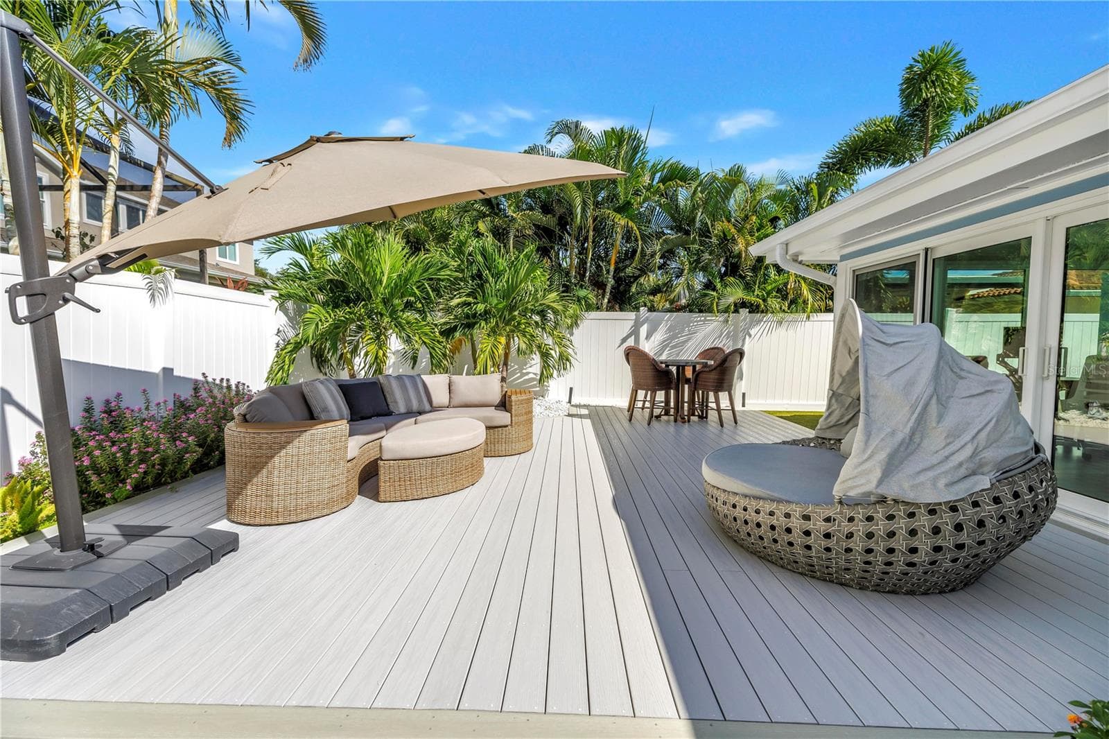 Sliders open to your outdoor living and dining room. - 1114 2ND AVE S, TIERRA VERDE