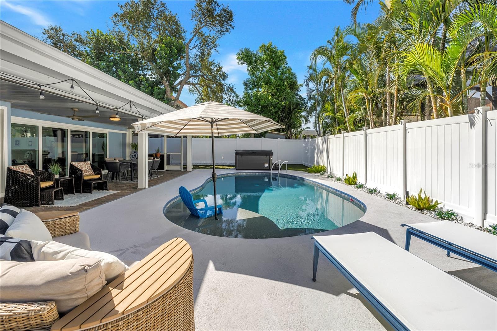 Heated AND Chilled six feet deep saltwater pool with sun shelf and umbrella option. - 1114 2ND AVE S, TIERRA VERDE