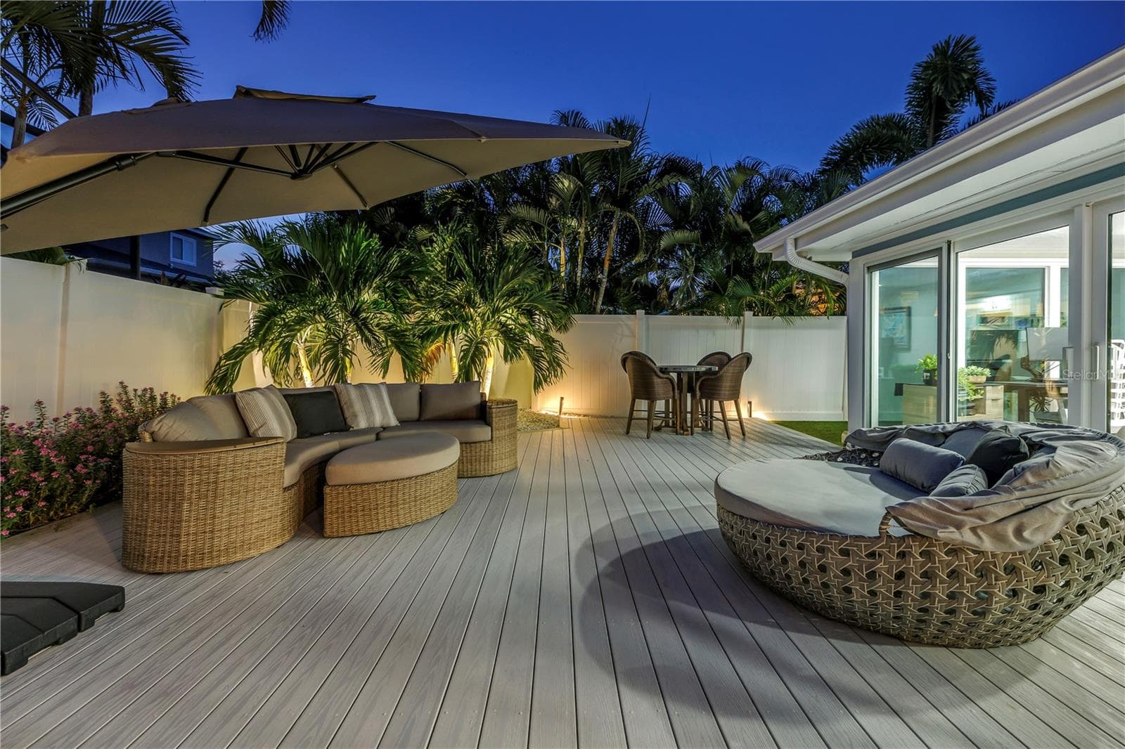 Outdoor living and dining options. - 1114 2ND AVE S, TIERRA VERDE