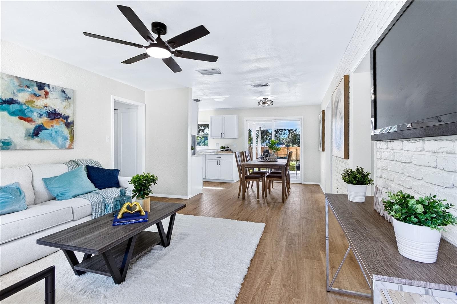 living room open to dining - 2426 S LAUREL AVE, SANFORD