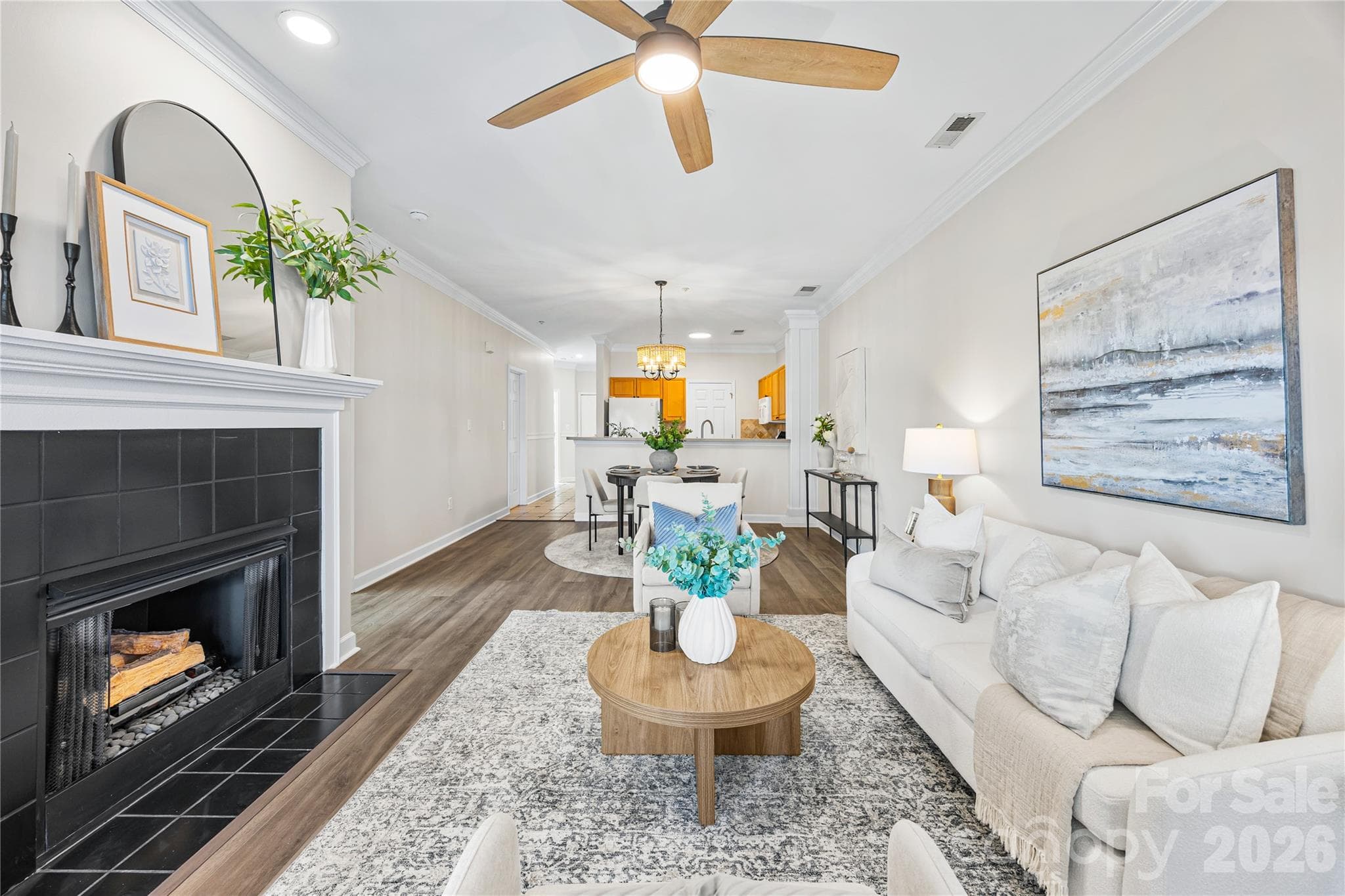 Enjoy a relaxing evening by the gas fireplace overlooking the water. - 915 Northeast Drive, Davidson