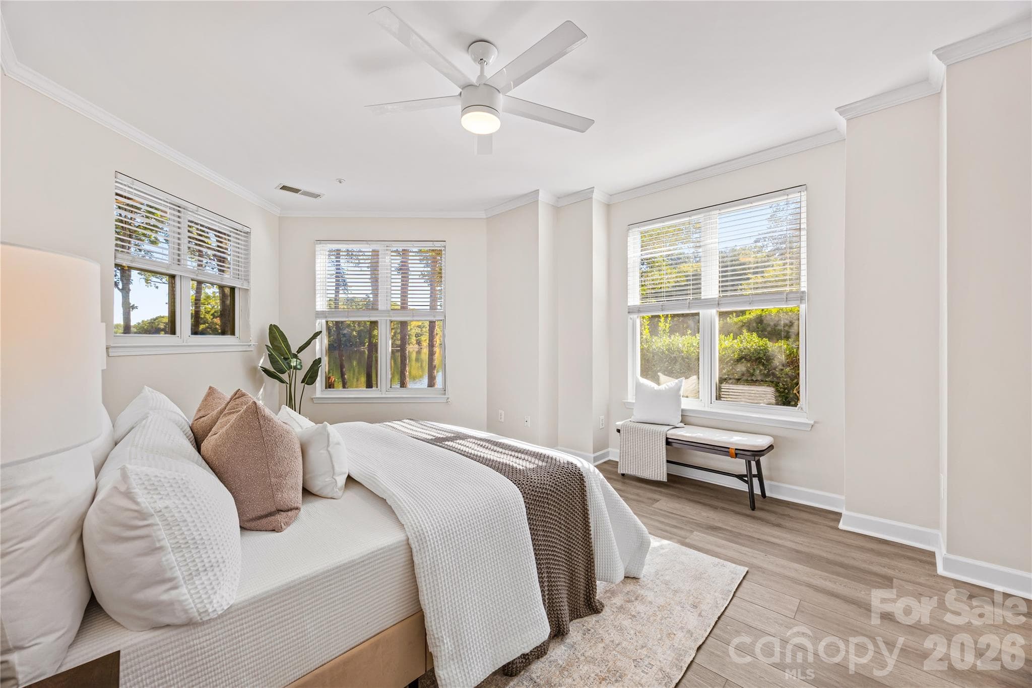 Primary bedroom with multiple water views! - 915 Northeast Drive, Davidson