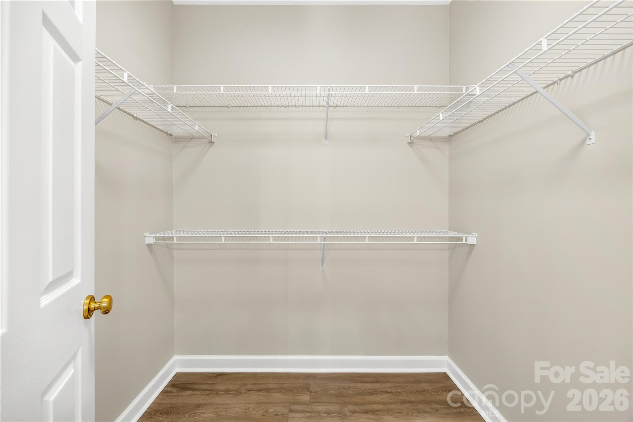Large primary closet with plenty of room to add more shelving! - 915 Northeast Drive, Davidson