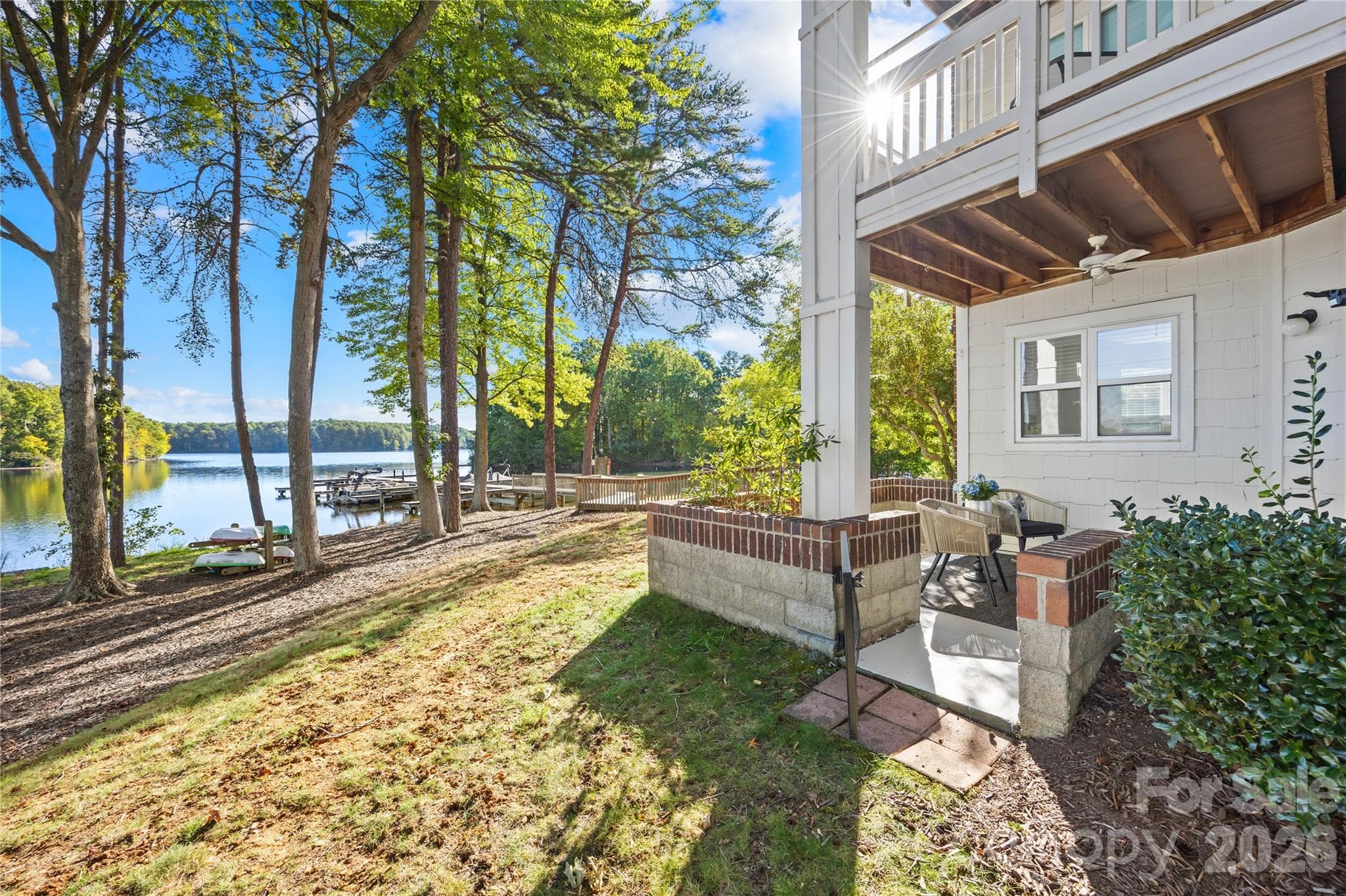 Tucked away in the farthest, ground corner of the building with additional windows for tons of sunlight and water views! - 915 Northeast Drive, Davidson